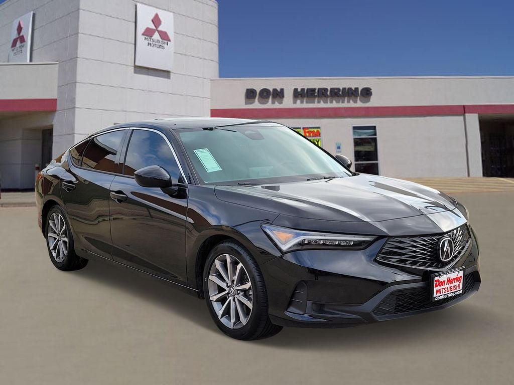 2024 Acura Integra Base in Black — front three-quarter view