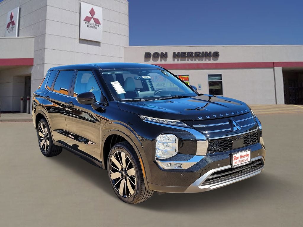 2026 Mitsubishi Outlander SE in Black Diamond — front three-quarter view
