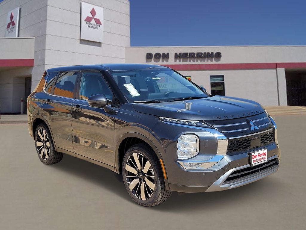 2026 Mitsubishi Outlander SE in Graphite Gray — front three-quarter view