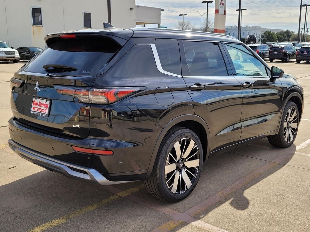2026 Mitsubishi Outlander — rear three-quarter view