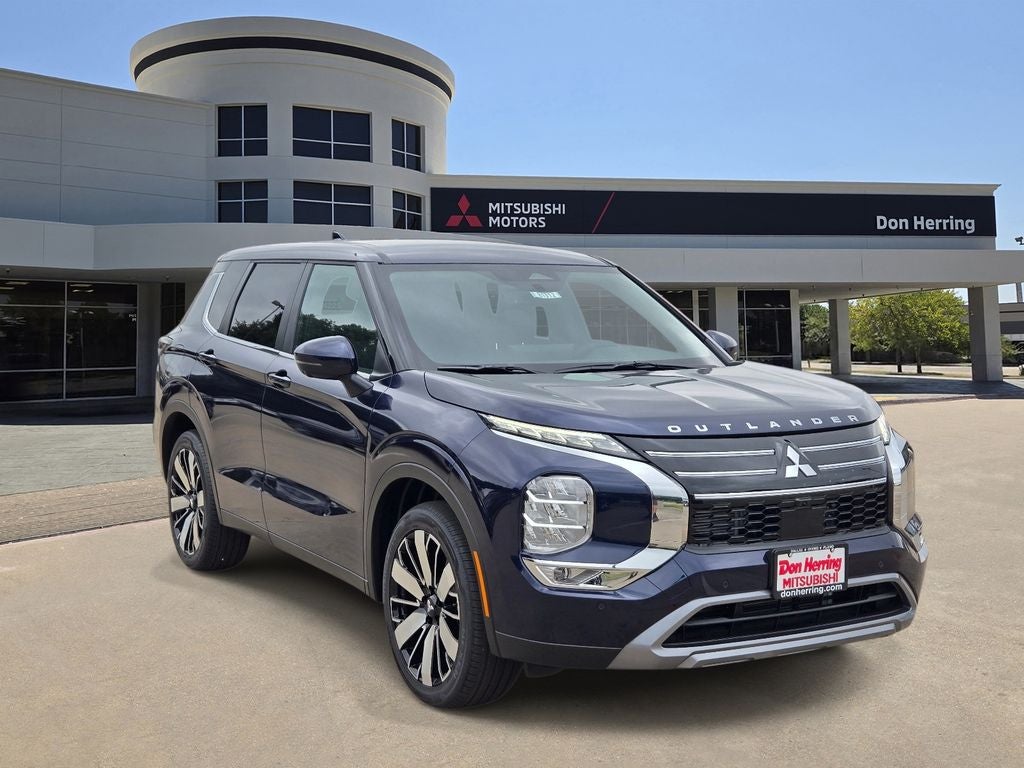 2026 Mitsubishi Outlander SE in Cosmic Blue Metallic — front three-quarter view