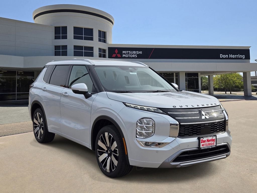 2026 Mitsubishi Outlander SEL in White Diamond — front three-quarter view