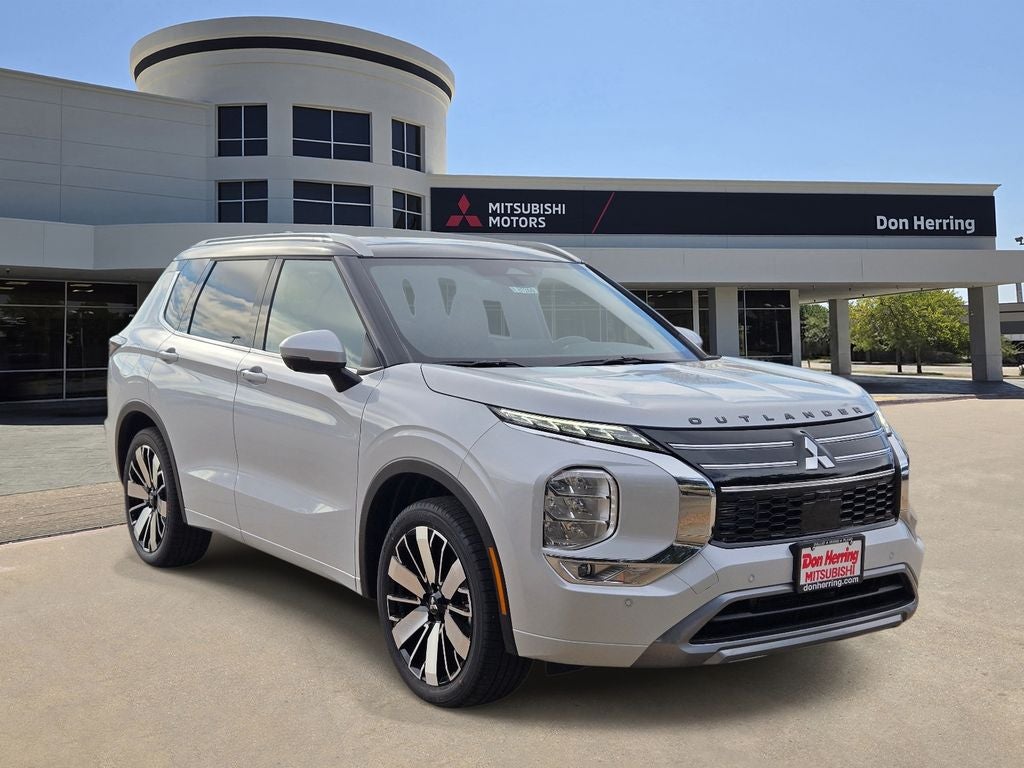 2026 Mitsubishi Outlander SEL in White Diamond — front three-quarter view